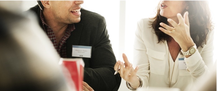 Image of employees talking
