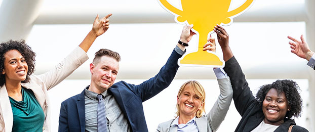 Stock image of smiling co-workers.