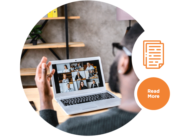 Image of a man in a virtual conference on a laptop.